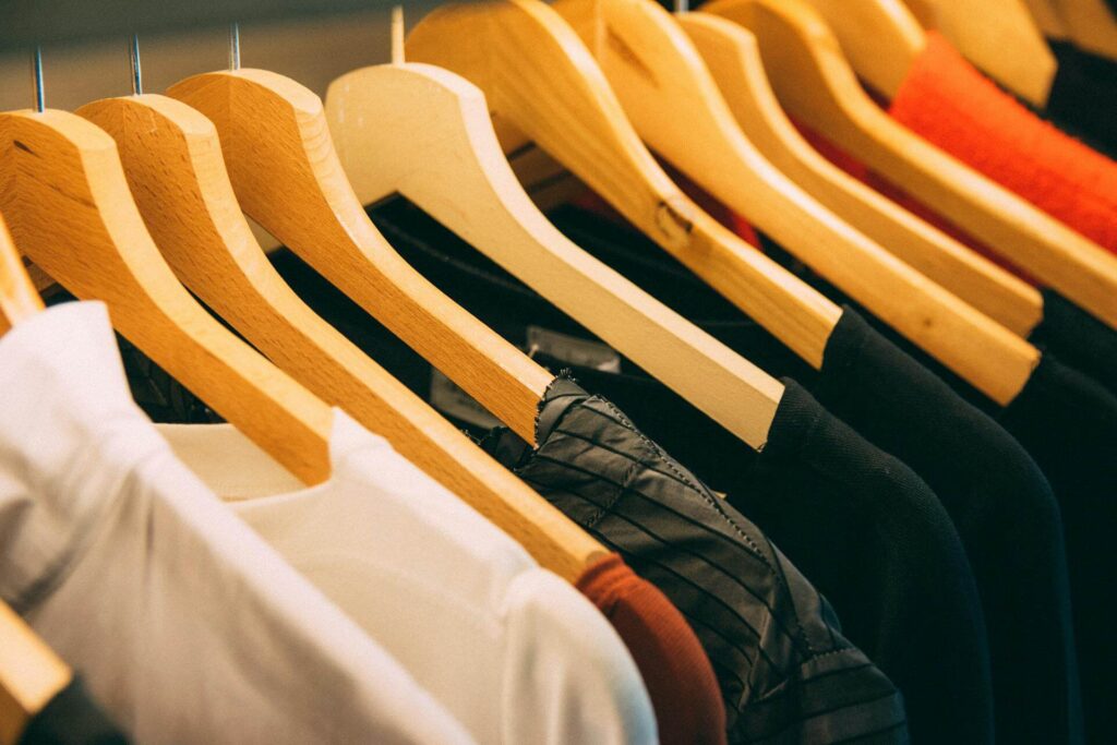 Apparel size stickers by Mark Bric Sizers for organized, efficient retail displays.