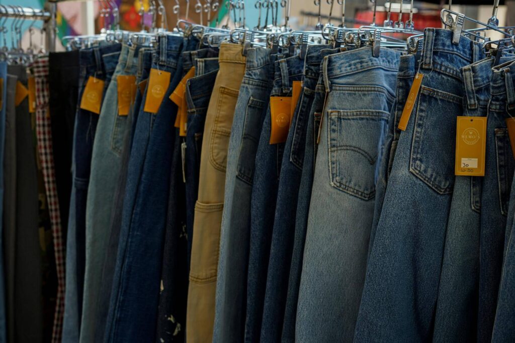 Clothing rack size rings offer efficient retail organization and easy apparel size identification by Mark Bric Sizers.