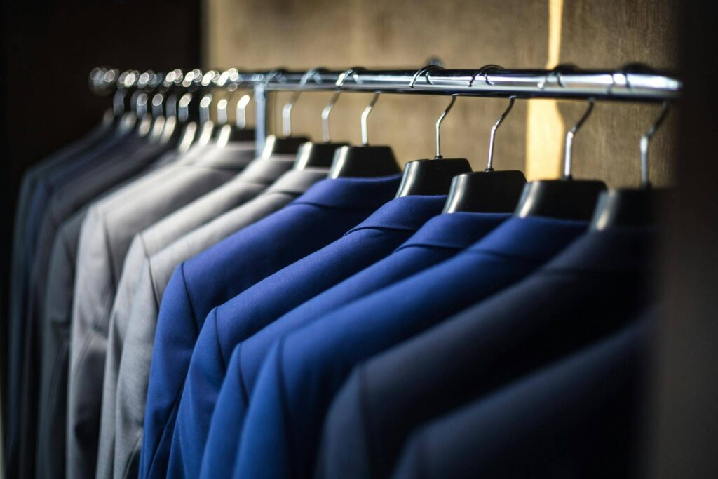 Garment rack dividers for retail stores by Mark Bric Sizers, ideal for efficient apparel organization.